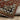 Indoor rug by Oriental Weavers, Vivian VI05X, with intricate patterns in beige and brown tones, measuring 2.3 by 7.6 feet.