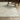 Indoor rug by Oriental Weavers, Lola LLA06 model, 2.7 x 7.7 feet, with a detailed geometric pattern in neutral tones.