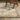 Indoor rug by Oriental Weavers, Acacia ACA03, 2x3 feet, with a detailed traditional pattern in warm earthy tones.