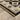 Indoor rug by Oriental Weavers, Acacia ACA09, 2x3 feet with a detailed pattern in warm earthy tones.