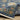 Indoor rug by Oriental Weavers, Lucca 2863B, 2x3 feet, featuring intricate patterns and warm tones in a cozy home setting.