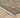 Indoor rug by Oriental Weavers, Lucca 5506K, in a 2x3 ft size with intricate pattern and soft woven texture.