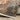 Indoor rug by Oriental Weavers, Lucca 8111K model, featuring a wave pattern in neutral tones, crafted for stylish home décor.
