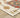 Oriental Weavers Lucca indoor rug in a 2x3 ft size with intricate design and warm tones, perfect for indoor living spaces.