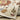 Indoor rug by Oriental Weavers, Lucca 8111W, 2x3 feet with intricate patterns and warm tones for living spaces.