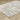 Oriental Weavers Verona 142E indoor rug displayed at an angle, showcasing its intricate pattern and rich colors.