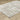 Oriental Weavers Verona 142E indoor rug displayed at an angle, showcasing its intricate pattern and rich colors.
