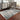 OwRugs Caravan 750W rug with intricate geometric patterns in warm tones, measuring 5.3 x 7.6 feet, soft and durable.
